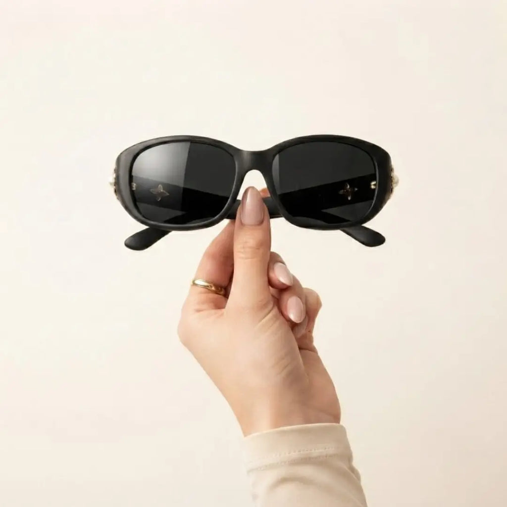 Black, oval-shaped sunglasses