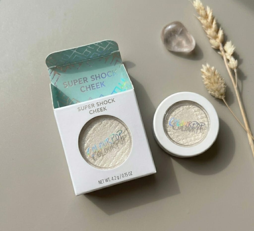 Color Pop highlighter and blush on Shade Over the moon