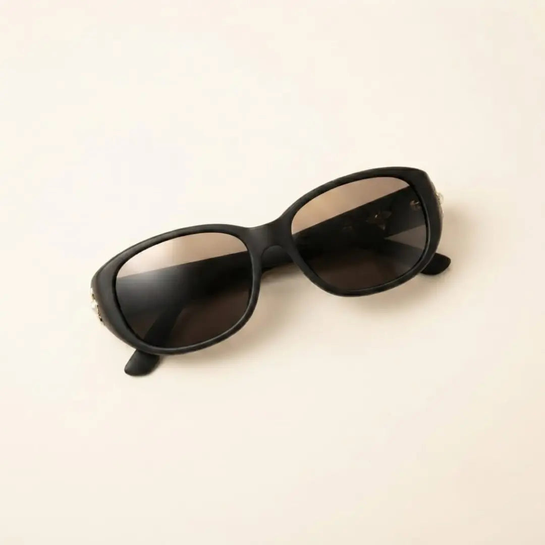 Black, oval-shaped sunglasses