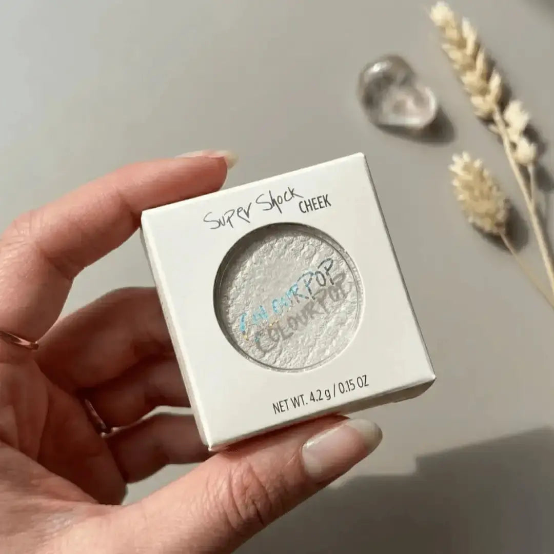 Color Pop highlighter and blush on Shade Over the moon