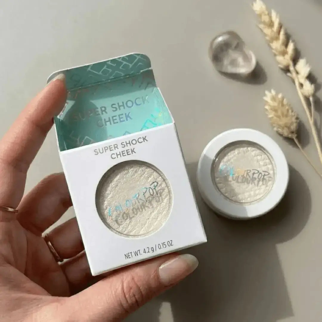 Color Pop highlighter and blush on Shade Over the moon